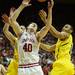 Indiana sophomore Cody Zeller reaches for a rebound around freshman Nik Stauskas and sophomore Jon Horford in the first half at Assembly Hall on Saturday, Feb. 2 in Bloomington, Ind. Melanie Maxwell I AnnArbor.com